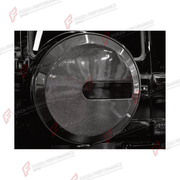 DRY CARBON SPARE WHEEL TIRE COVER for MERCEDES-BENZ G-CLASS W465 G63 G450D G500 G550 2025+ FORZA PERFORMANCE custom fit OEM Style

Set includes:
Spare Wheel Tire Cover

Material: Dry Carbon

NOTE: Professional installation is required.