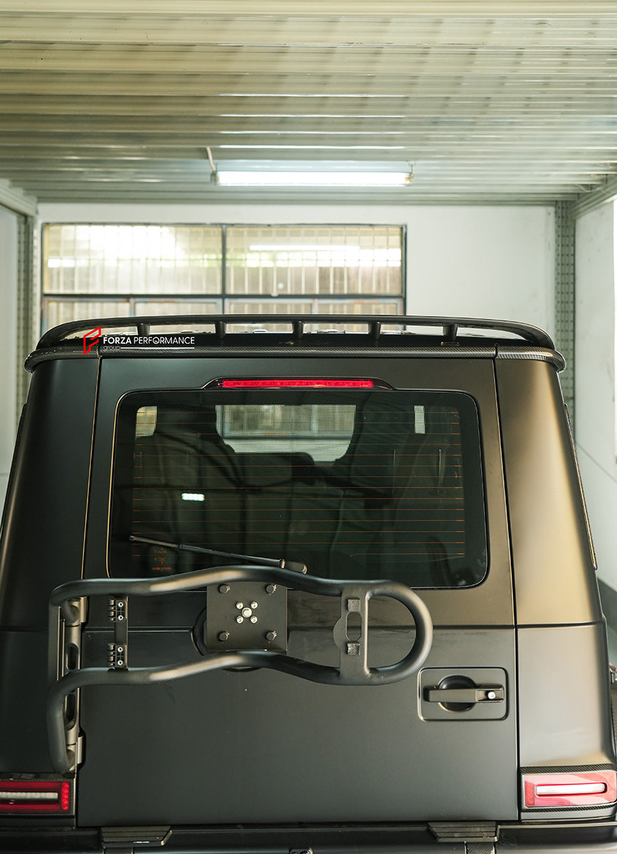DRY CARBON SPOILER for MERCEDES BENZ AMG G63 W465 G350 G500 G550 AMG G63 2024+

Set includes:

Spoiler

Material: Dry carbon

NOTE: Professional installation is required

CONTACT US FOR PRICING