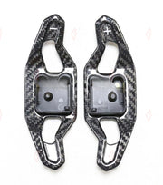 DRY CARBON STEERING WHEEL PADDLE SHIFTERS for AUDI A4 A5 A6 A7 A8 Q2 E-TRON 2020 - 2021
Set includes:

Steering Wheel Paddle Shifters (pair)
Material: Dry Carbon

NOTE: Fits 2020 - 2021 A6 A7 C8, A8 D5, A4 A5 S4 S5 B9 PA, Q2, E-TRON. Professional installation is required.