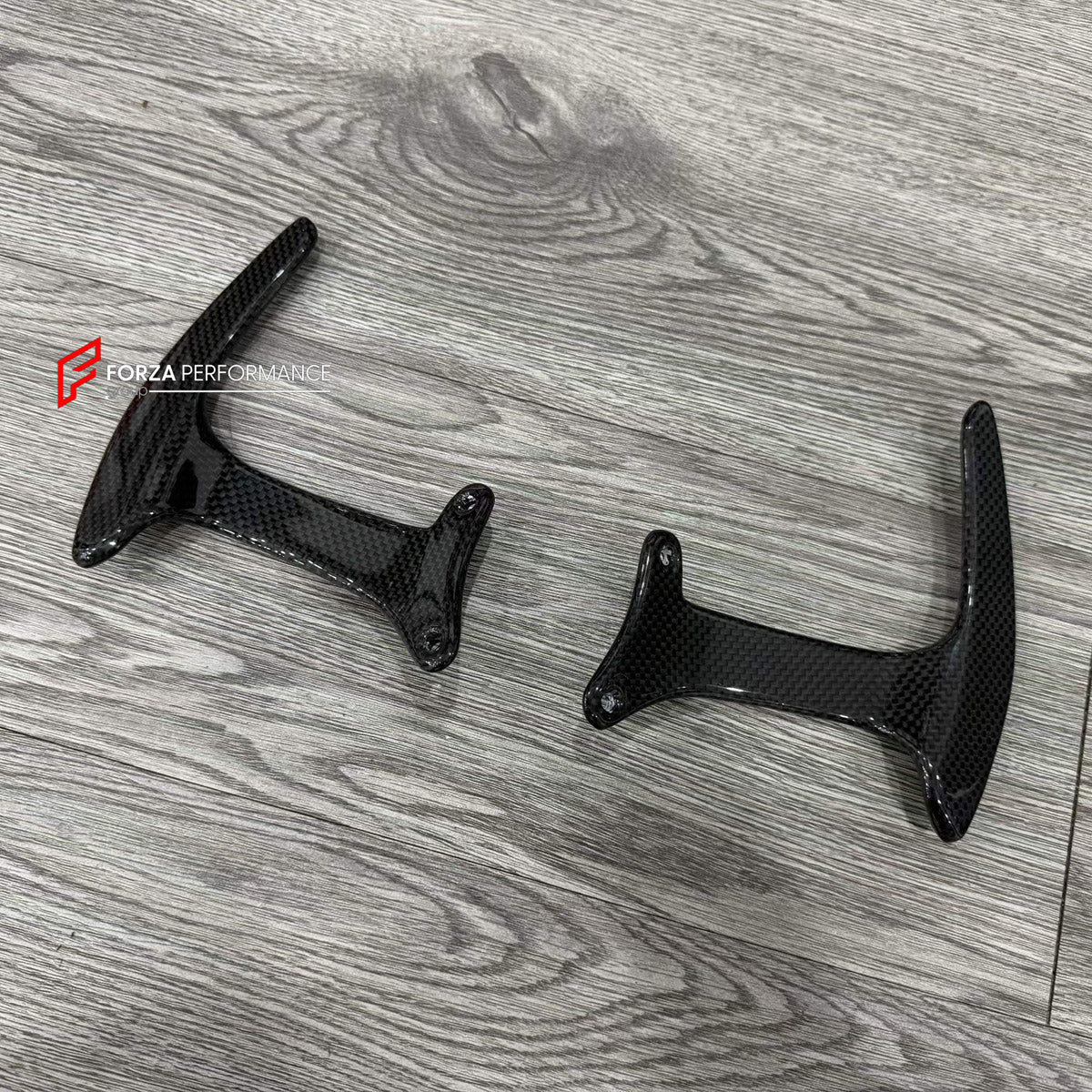 DRY CARBON STEERING WHEEL SHIFT PADDLES for FERRARI 488 GTB 2015 - 2020

Set includes:
Steering Wheel Shift Paddles

Material: Dry Carbon

NOTE: Professional installation is required.