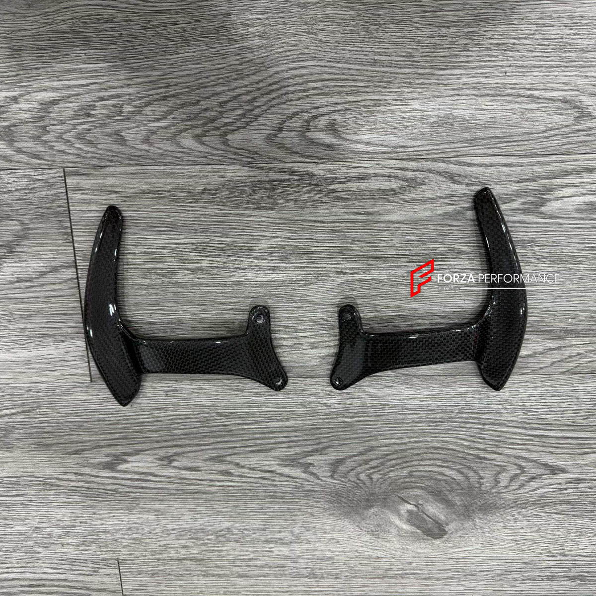 DRY CARBON STEERING WHEEL SHIFT PADDLES for FERRARI 488 GTB 2015 - 2020

Set includes:
Steering Wheel Shift Paddles

Material: Dry Carbon

NOTE: Professional installation is required.