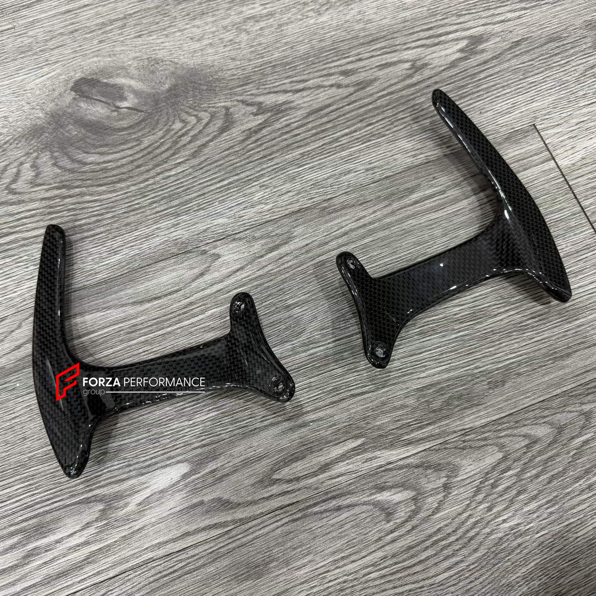 DRY CARBON STEERING WHEEL SHIFT PADDLES for FERRARI 488 GTB 2015 - 2020

Set includes:
Steering Wheel Shift Paddles

Material: Dry Carbon

NOTE: Professional installation is required.
