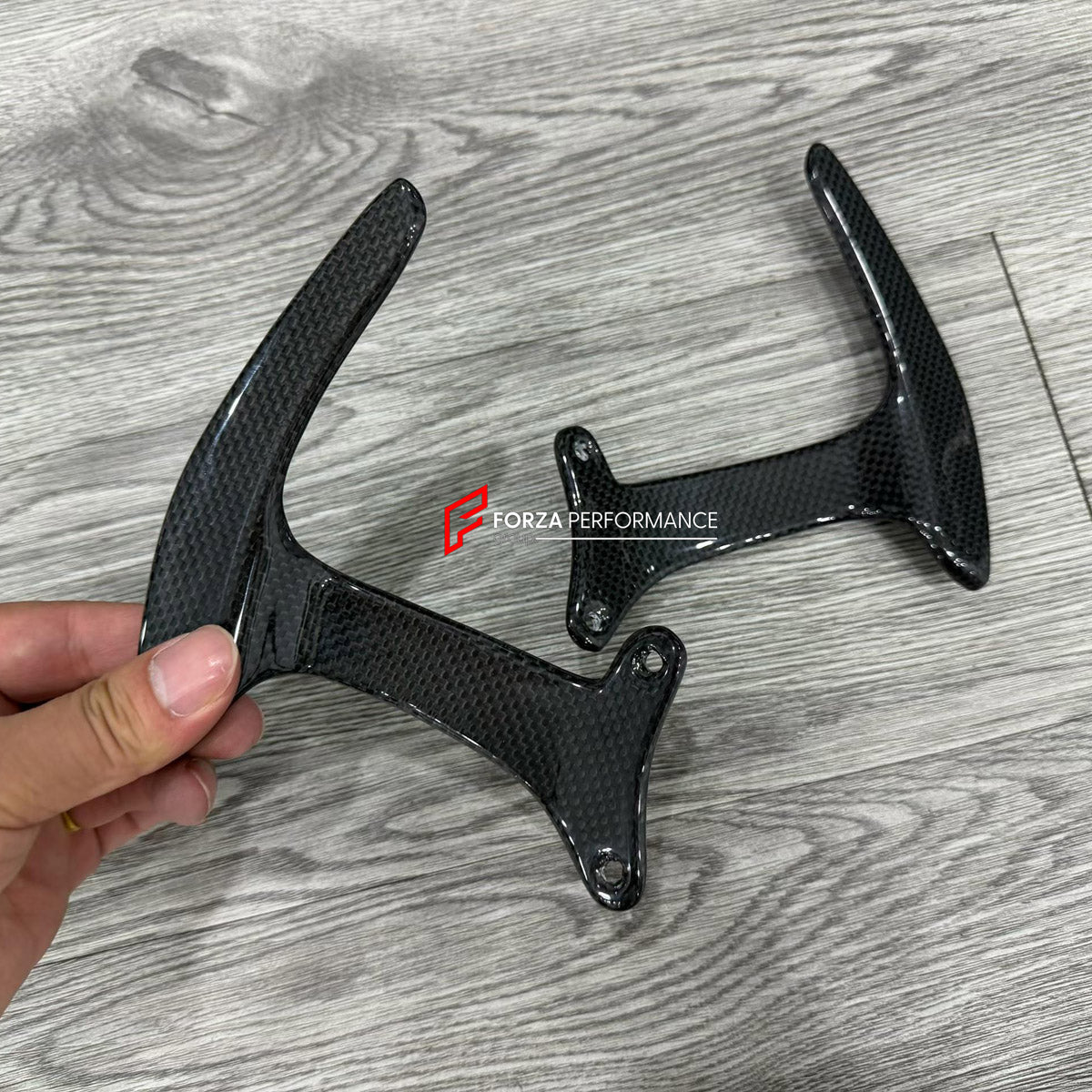 DRY CARBON STEERING WHEEL SHIFT PADDLES for FERRARI 488 GTB 2015 - 2020

Set includes:
Steering Wheel Shift Paddles

Material: Dry Carbon

NOTE: Professional installation is required.