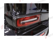 DRY CARBON TAIL LIGHT COVERS for MERCEDES-BENZ G-CLASS W465 G63 G450D G500 G550 2025+

Set includes:
Tail Light Covers

Material: Dry Carbon

NOTE: Professional installation is required.