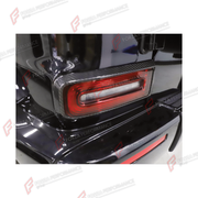 DRY CARBON TAIL TURN SIGNAL LIGHT COVERS for MERCEDES-BENZ G-CLASS W464 2019 - 2024

Set includes:
Tail Turn Signal Light Covers

Material: Dry Carbon

NOTE: Professional installation is required.