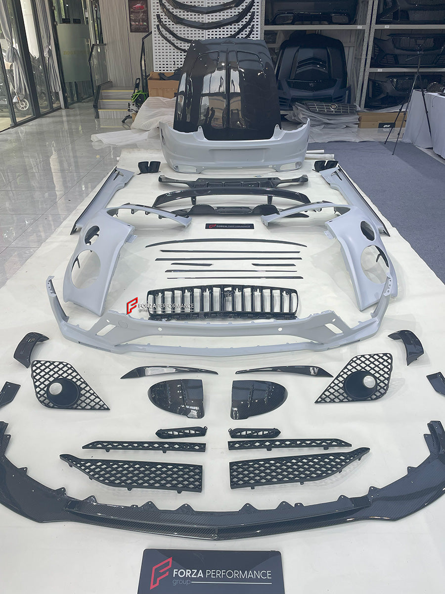 DRY CARBON WIDE BODY KIT for BENTLEY CONTINENTAL GT GTC 2018 - 2024

Set includes:
Front Lip
Front Bumper
Front Bumper Trims
Grille
Hood / Bonnet
Front Fenders
Side Mirror Covers
Side Trims
Side Skirts
Folding Roof Cover
Rear Spoiler
Rear Bumper
Rear Diffuser

Material: Dry Carbon

Note: Professional installation is required.