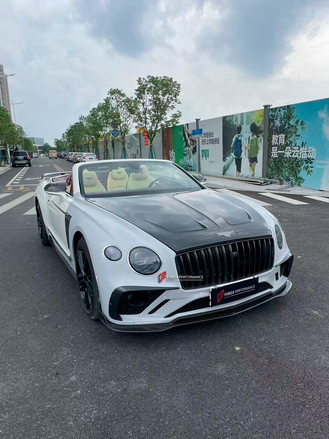 DRY CARBON WIDE BODY KIT for BENTLEY CONTINENTAL GT GTC 2018 - 2024

Set includes:
Front Lip
Front Bumper
Front Bumper Trims
Grille
Hood / Bonnet
Front Fenders
Side Mirror Covers
Side Trims
Side Skirts
Folding Roof Cover
Rear Spoiler
Rear Bumper
Rear Diffuser

Material: Dry Carbon

Note: Professional installation is required.