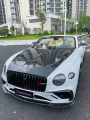 DRY CARBON WIDE BODY KIT for BENTLEY CONTINENTAL GT GTC 2018 - 2024

Set includes:
Front Lip
Front Bumper
Front Bumper Trims
Grille
Hood / Bonnet
Front Fenders
Side Mirror Covers
Side Trims
Side Skirts
Folding Roof Cover
Rear Spoiler
Rear Bumper
Rear Diffuser

Material: Dry Carbon

Note: Professional installation is required.