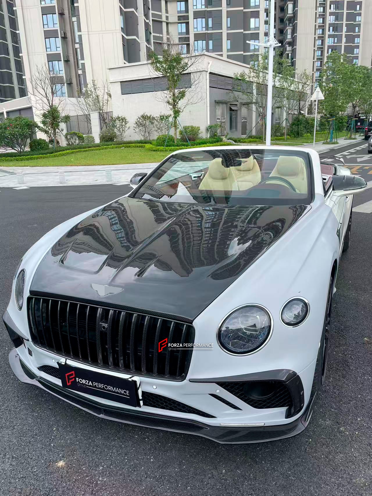 DRY CARBON WIDE BODY KIT for BENTLEY CONTINENTAL GT GTC 2018 - 2024

Set includes:
Front Lip
Front Bumper
Front Bumper Trims
Grille
Hood / Bonnet
Front Fenders
Side Mirror Covers
Side Trims
Side Skirts
Folding Roof Cover
Rear Spoiler
Rear Bumper
Rear Diffuser

Material: Dry Carbon

Note: Professional installation is required.