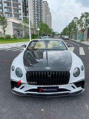 DRY CARBON WIDE BODY KIT for BENTLEY CONTINENTAL GT GTC 2018 - 2024

Set includes:
Front Lip
Front Bumper
Front Bumper Trims
Grille
Hood / Bonnet
Front Fenders
Side Mirror Covers
Side Trims
Side Skirts
Folding Roof Cover
Rear Spoiler
Rear Bumper
Rear Diffuser

Material: Dry Carbon

Note: Professional installation is required.