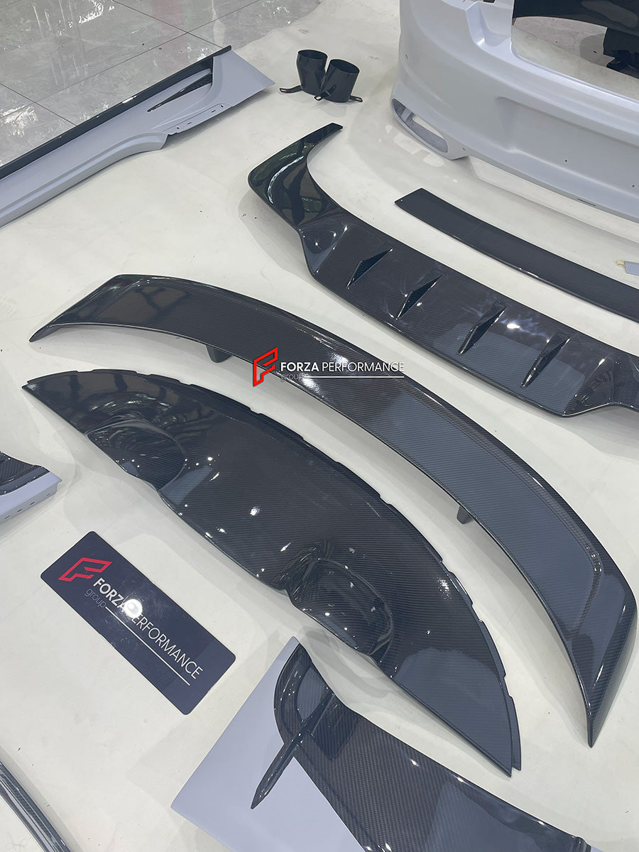DRY CARBON WIDE BODY KIT for BENTLEY CONTINENTAL GT GTC 2018 - 2024

Set includes:
Front Lip
Front Bumper
Front Bumper Trims
Grille
Hood / Bonnet
Front Fenders
Side Mirror Covers
Side Trims
Side Skirts
Folding Roof Cover
Rear Spoiler
Rear Bumper
Rear Diffuser

Material: Dry Carbon

Note: Professional installation is required.