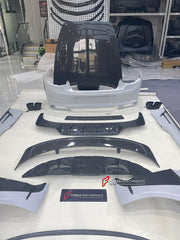 DRY CARBON WIDE BODY KIT for BENTLEY CONTINENTAL GT GTC 2018 - 2024

Set includes:
Front Lip
Front Bumper
Front Bumper Trims
Grille
Hood / Bonnet
Front Fenders
Side Mirror Covers
Side Trims
Side Skirts
Folding Roof Cover
Rear Spoiler
Rear Bumper
Rear Diffuser

Material: Dry Carbon

Note: Professional installation is required.