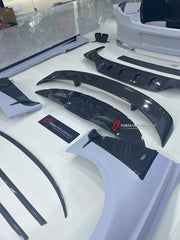 DRY CARBON WIDE BODY KIT for BENTLEY CONTINENTAL GT GTC 2018 - 2024

Set includes:
Front Lip
Front Bumper
Front Bumper Trims
Grille
Hood / Bonnet
Front Fenders
Side Mirror Covers
Side Trims
Side Skirts
Folding Roof Cover
Rear Spoiler
Rear Bumper
Rear Diffuser

Material: Dry Carbon

Note: Professional installation is required.