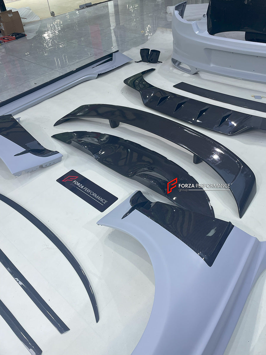 DRY CARBON WIDE BODY KIT for BENTLEY CONTINENTAL GT GTC 2018 - 2024

Set includes:
Front Lip
Front Bumper
Front Bumper Trims
Grille
Hood / Bonnet
Front Fenders
Side Mirror Covers
Side Trims
Side Skirts
Folding Roof Cover
Rear Spoiler
Rear Bumper
Rear Diffuser

Material: Dry Carbon

Note: Professional installation is required.
