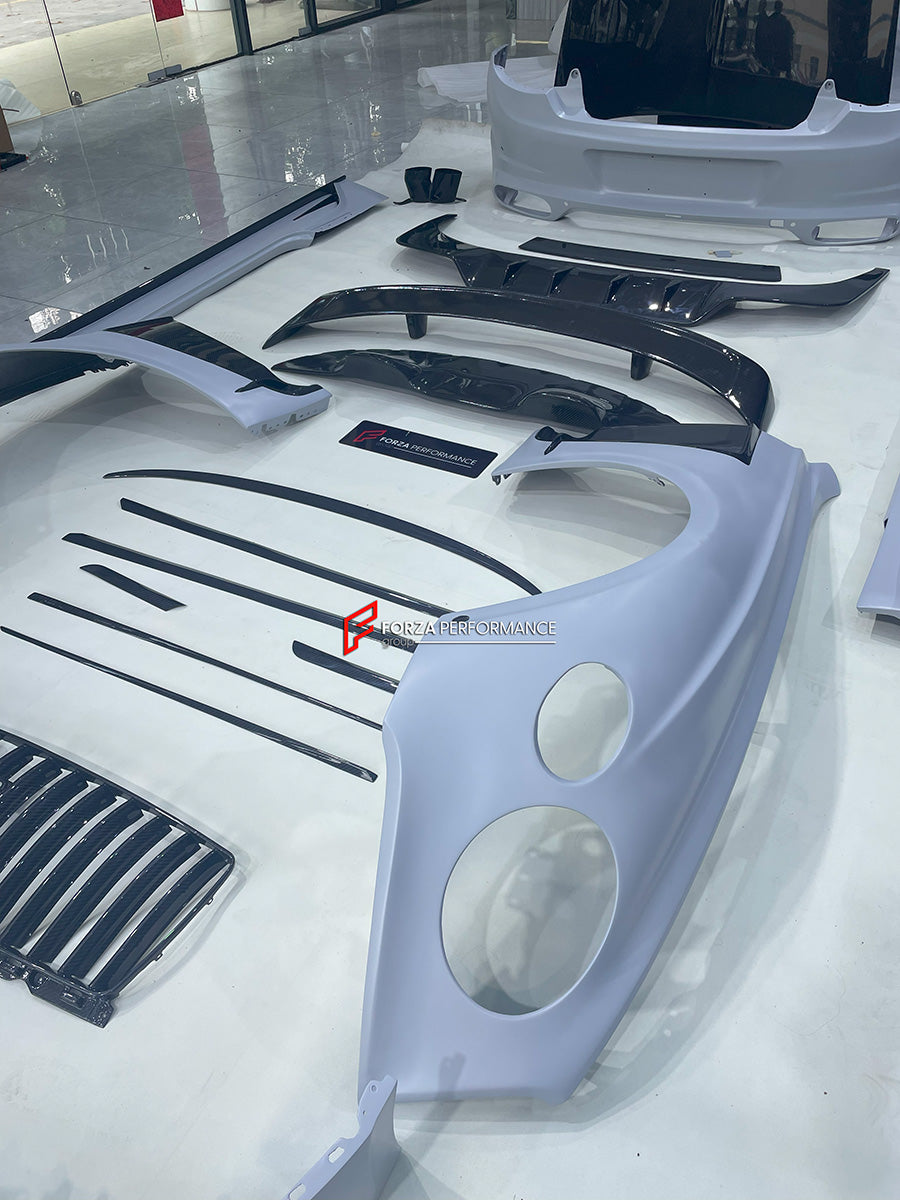 DRY CARBON WIDE BODY KIT for BENTLEY CONTINENTAL GT GTC 2018 - 2024

Set includes:
Front Lip
Front Bumper
Front Bumper Trims
Grille
Hood / Bonnet
Front Fenders
Side Mirror Covers
Side Trims
Side Skirts
Folding Roof Cover
Rear Spoiler
Rear Bumper
Rear Diffuser

Material: Dry Carbon

Note: Professional installation is required.