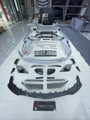 DRY CARBON WIDE BODY KIT for BENTLEY CONTINENTAL GT GTC 2018 - 2024

Set includes:
Front Lip
Front Bumper
Front Bumper Trims
Grille
Hood / Bonnet
Front Fenders
Side Mirror Covers
Side Trims
Side Skirts
Folding Roof Cover
Rear Spoiler
Rear Bumper
Rear Diffuser

Material: Dry Carbon

Note: Professional installation is required.