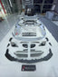 DRY CARBON WIDE BODY KIT for BENTLEY CONTINENTAL GT GTC 2018 - 2024

Set includes:
Front Lip
Front Bumper
Front Bumper Trims
Grille
Hood / Bonnet
Front Fenders
Side Mirror Covers
Side Trims
Side Skirts
Folding Roof Cover
Rear Spoiler
Rear Bumper
Rear Diffuser

Material: Dry Carbon

Note: Professional installation is required.