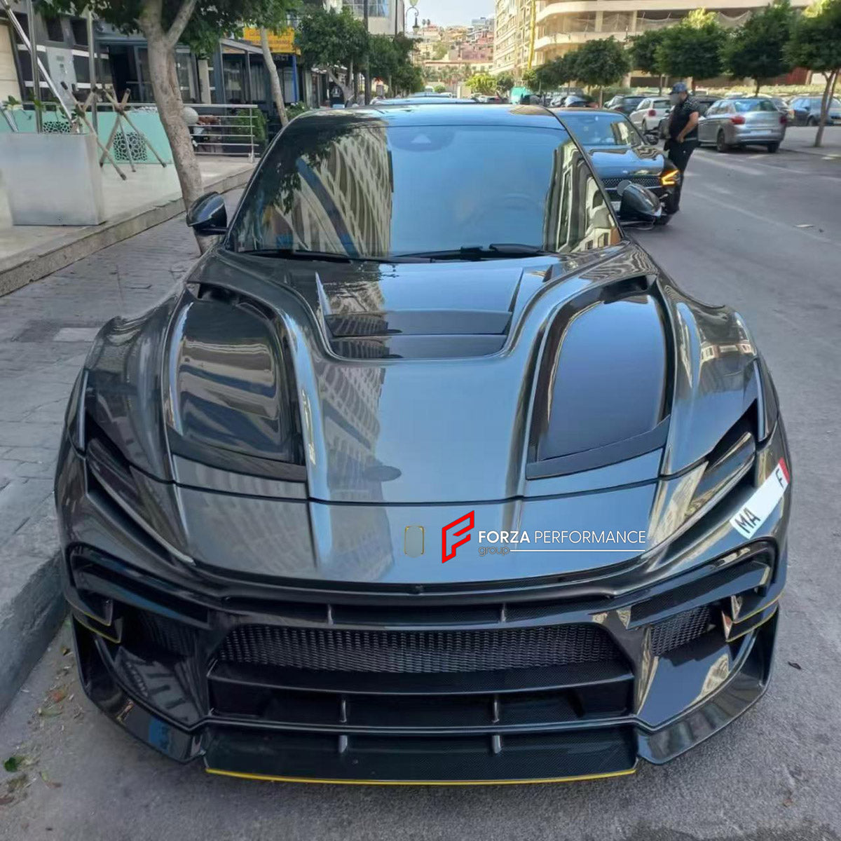 DRY CARBON WIDE BODY KIT for FERRARI PUROSANGUE 2023+ FORZA PERFORMANCE Mansory Keyvany
Set includes:

Front Lip
Front Bumper Assembly
Hood Bonnet
Front Fenders
Fender Flares
Side Skirts
Rear Fenders
Roof Spoiler
Ducktail Spoiler
Rear Diffuser
Rear Bumper Assembly
Material: Dry Carbon

NOTE: Professional installation is required.