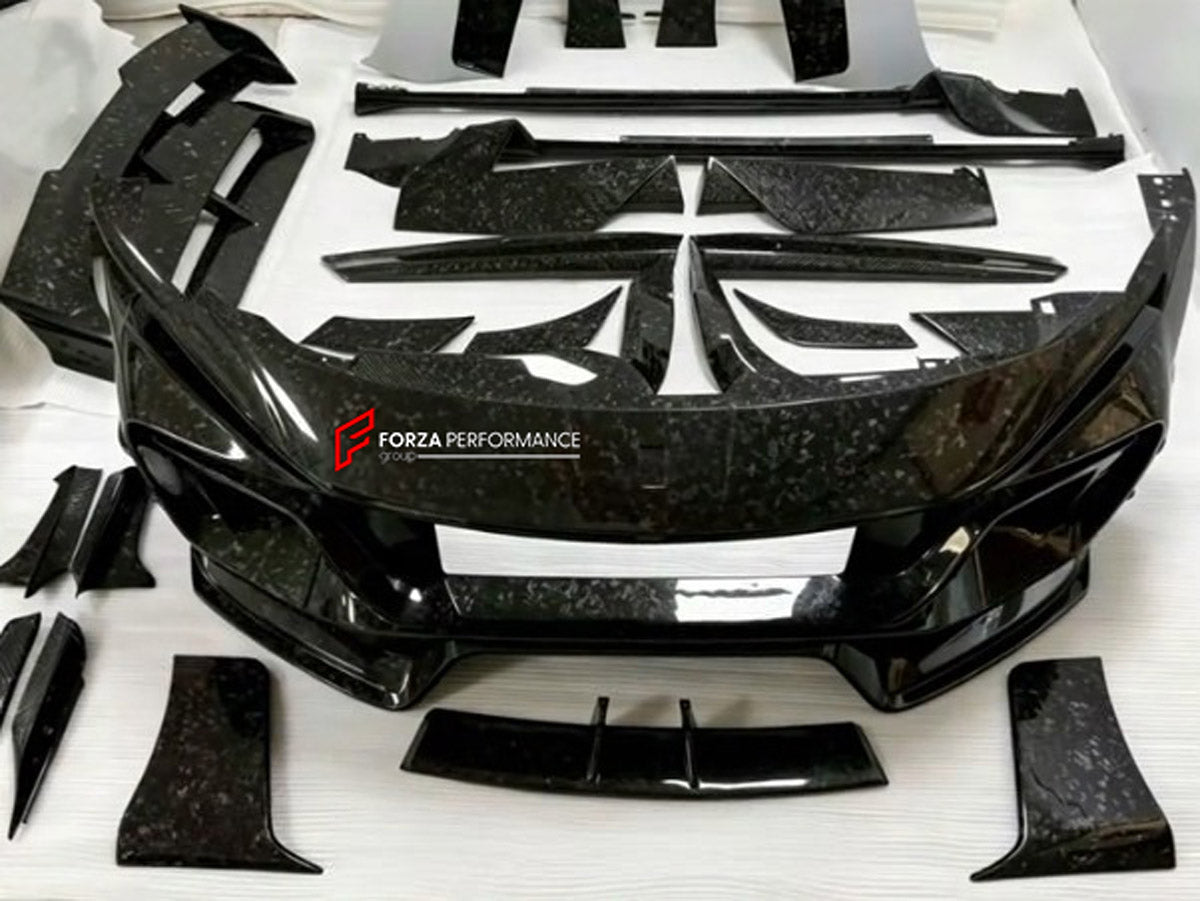 DRY CARBON WIDE BODY KIT for FERRARI PUROSANGUE 2023+ FORZA PERFORMANCE Mansory Keyvany
Set includes:

Front Lip
Front Bumper Assembly
Hood Bonnet
Front Fenders
Fender Flares
Side Skirts
Rear Fenders
Roof Spoiler
Ducktail Spoiler
Rear Diffuser
Rear Bumper Assembly
Material: Dry Carbon

NOTE: Professional installation is required.