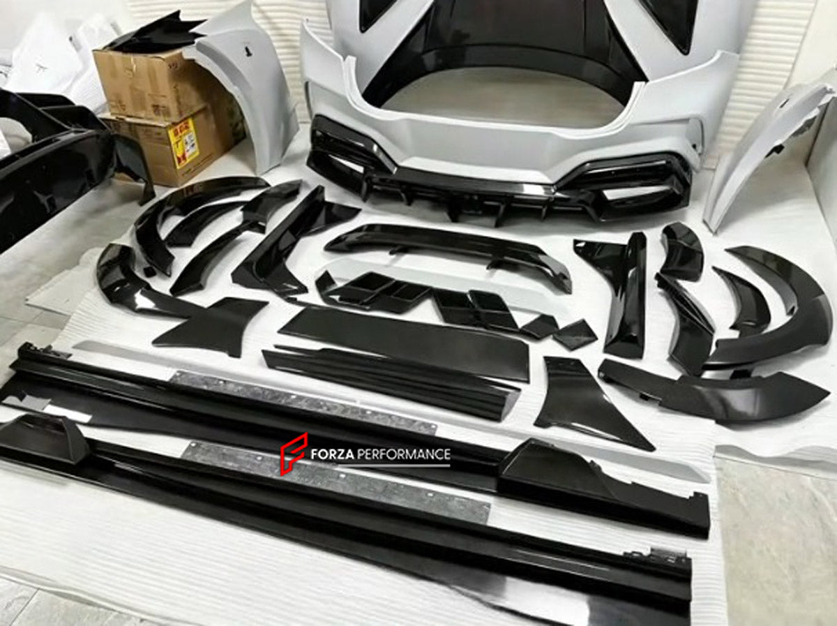 DRY CARBON WIDE BODY KIT for FERRARI PUROSANGUE 2023+ FORZA PERFORMANCE Mansory Keyvany
Set includes:

Front Lip
Front Bumper Assembly
Hood Bonnet
Front Fenders
Fender Flares
Side Skirts
Rear Fenders
Roof Spoiler
Ducktail Spoiler
Rear Diffuser
Rear Bumper Assembly
Material: Dry Carbon

NOTE: Professional installation is required.