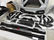 DRY CARBON WIDE BODY KIT for FERRARI PUROSANGUE 2023+ FORZA PERFORMANCE Mansory Keyvany
Set includes:

Front Lip
Front Bumper Assembly
Hood Bonnet
Front Fenders
Fender Flares
Side Skirts
Rear Fenders
Roof Spoiler
Ducktail Spoiler
Rear Diffuser
Rear Bumper Assembly
Material: Dry Carbon

NOTE: Professional installation is required.