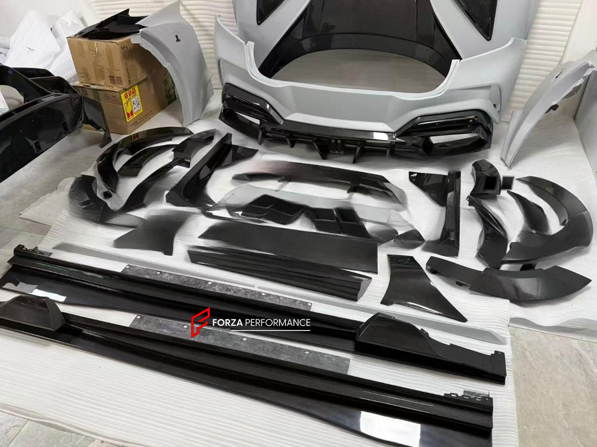 DRY CARBON WIDE BODY KIT for FERRARI PUROSANGUE 2023+ FORZA PERFORMANCE Mansory Keyvany
Set includes:

Front Lip
Front Bumper Assembly
Hood Bonnet
Front Fenders
Fender Flares
Side Skirts
Rear Fenders
Roof Spoiler
Ducktail Spoiler
Rear Diffuser
Rear Bumper Assembly
Material: Dry Carbon

NOTE: Professional installation is required.