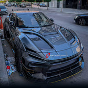 DRY CARBON WIDE BODY KIT for FERRARI PUROSANGUE 2023+ FORZA PERFORMANCE Mansory Keyvany
Set includes:

Front Lip
Front Bumper Assembly
Hood Bonnet
Front Fenders
Fender Flares
Side Skirts
Rear Fenders
Roof Spoiler
Ducktail Spoiler
Rear Diffuser
Rear Bumper Assembly
Material: Dry Carbon

NOTE: Professional installation is required.