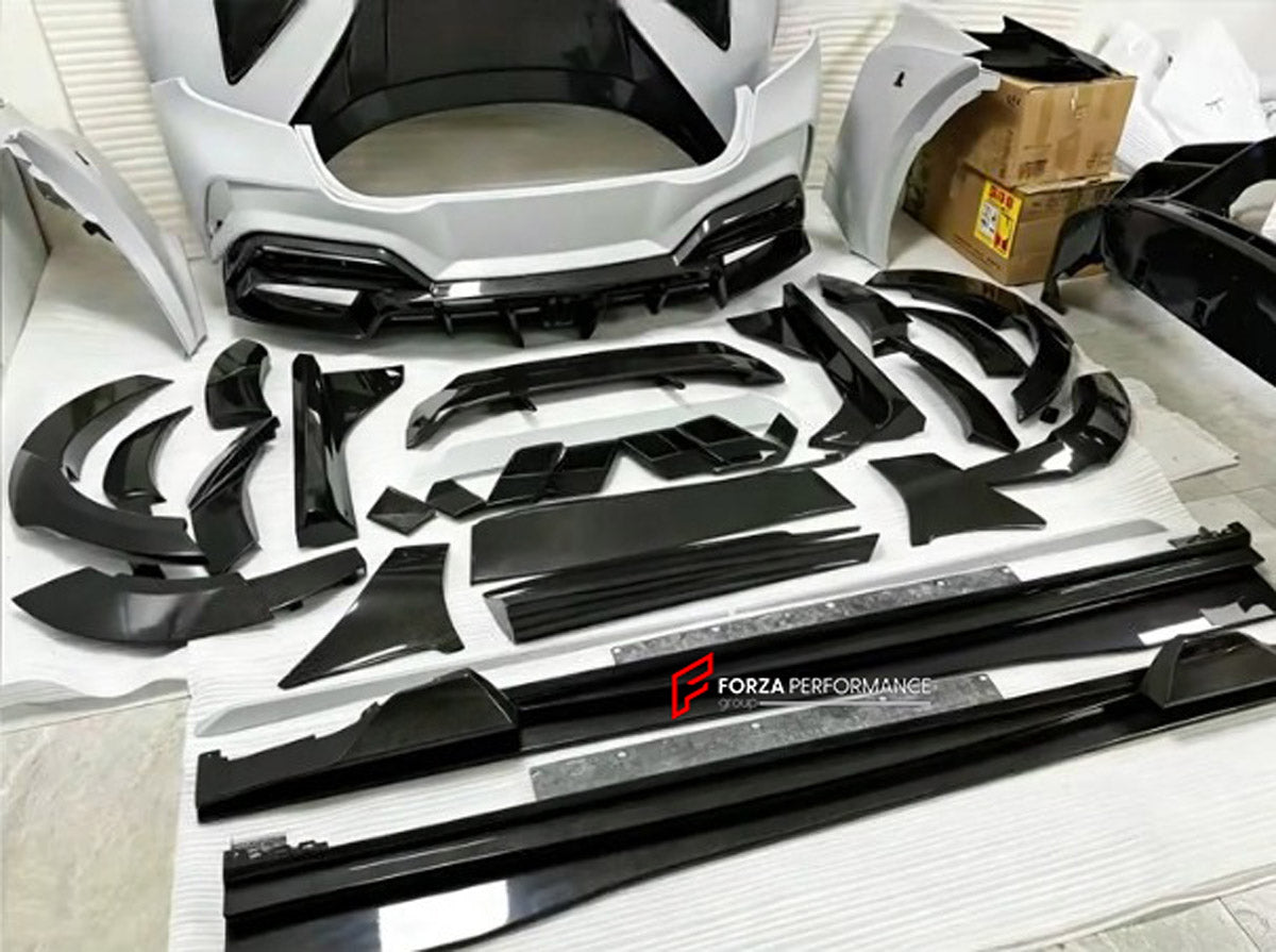 DRY CARBON WIDE BODY KIT for FERRARI PUROSANGUE 2023+ FORZA PERFORMANCE Mansory Keyvany
Set includes:

Front Lip
Front Bumper Assembly
Hood Bonnet
Front Fenders
Fender Flares
Side Skirts
Rear Fenders
Roof Spoiler
Ducktail Spoiler
Rear Diffuser
Rear Bumper Assembly
Material: Dry Carbon

NOTE: Professional installation is required.