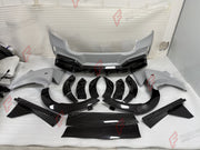 DRY CARBON WIDE BODY KIT for FERRARI PUROSANGUE 2023+ FORZA PERFORMANCE Mansory Keyvany
Set includes:

Front Lip
Front Bumper Assembly
Hood Bonnet
Front Fenders
Fender Flares
Side Skirts
Rear Fenders
Roof Spoiler
Ducktail Spoiler
Rear Diffuser
Rear Bumper Assembly
Material: Dry Carbon

NOTE: Professional installation is required.