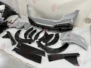 DRY CARBON WIDE BODY KIT for FERRARI PUROSANGUE 2023+ FORZA PERFORMANCE Mansory Keyvany
Set includes:

Front Lip
Front Bumper Assembly
Hood Bonnet
Front Fenders
Fender Flares
Side Skirts
Rear Fenders
Roof Spoiler
Ducktail Spoiler
Rear Diffuser
Rear Bumper Assembly
Material: Dry Carbon

NOTE: Professional installation is required.
