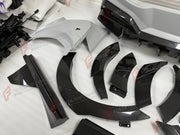 DRY CARBON WIDE BODY KIT for FERRARI PUROSANGUE 2023+ FORZA PERFORMANCE Mansory Keyvany
Set includes:

Front Lip
Front Bumper Assembly
Hood Bonnet
Front Fenders
Fender Flares
Side Skirts
Rear Fenders
Roof Spoiler
Ducktail Spoiler
Rear Diffuser
Rear Bumper Assembly
Material: Dry Carbon

NOTE: Professional installation is required.