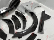 DRY CARBON WIDE BODY KIT for FERRARI PUROSANGUE 2023+ FORZA PERFORMANCE Mansory Keyvany
Set includes:

Front Lip
Front Bumper Assembly
Hood Bonnet
Front Fenders
Fender Flares
Side Skirts
Rear Fenders
Roof Spoiler
Ducktail Spoiler
Rear Diffuser
Rear Bumper Assembly
Material: Dry Carbon

NOTE: Professional installation is required.