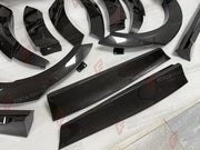 DRY CARBON WIDE BODY KIT for FERRARI PUROSANGUE 2023+ FORZA PERFORMANCE Mansory Keyvany
Set includes:

Front Lip
Front Bumper Assembly
Hood Bonnet
Front Fenders
Fender Flares
Side Skirts
Rear Fenders
Roof Spoiler
Ducktail Spoiler
Rear Diffuser
Rear Bumper Assembly
Material: Dry Carbon

NOTE: Professional installation is required.