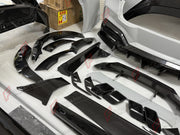 DRY CARBON WIDE BODY KIT for FERRARI PUROSANGUE 2023+ FORZA PERFORMANCE Mansory Keyvany
Set includes:

Front Lip
Front Bumper Assembly
Hood Bonnet
Front Fenders
Fender Flares
Side Skirts
Rear Fenders
Roof Spoiler
Ducktail Spoiler
Rear Diffuser
Rear Bumper Assembly
Material: Dry Carbon

NOTE: Professional installation is required.