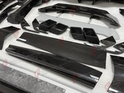 DRY CARBON WIDE BODY KIT for FERRARI PUROSANGUE 2023+ FORZA PERFORMANCE Mansory Keyvany
Set includes:

Front Lip
Front Bumper Assembly
Hood Bonnet
Front Fenders
Fender Flares
Side Skirts
Rear Fenders
Roof Spoiler
Ducktail Spoiler
Rear Diffuser
Rear Bumper Assembly
Material: Dry Carbon

NOTE: Professional installation is required.