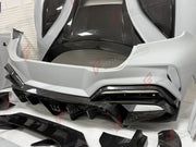DRY CARBON WIDE BODY KIT for FERRARI PUROSANGUE 2023+ FORZA PERFORMANCE Mansory Keyvany
Set includes:

Front Lip
Front Bumper Assembly
Hood Bonnet
Front Fenders
Fender Flares
Side Skirts
Rear Fenders
Roof Spoiler
Ducktail Spoiler
Rear Diffuser
Rear Bumper Assembly
Material: Dry Carbon

NOTE: Professional installation is required.