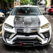 DRY CARBON WIDE BODY KIT for LAMBORGHINI URUS 2018 - 2025 FORZA PERFORMANCE custom fit Mansory Style

Set includes:
Front Lip
Front Bumper Assembly
Hood Bonnet
Fender Flares
Side Skirts
Roof Spoiler
Ducktail Spoiler
Rear Bumper Assembly
Rear Diffuser
Exhaust System

Material: Dry Carbon

NOTE: Professional installation is required.