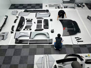 DRY CARBON WIDE BODY KIT for LAND ROVER DEFENDER L663 90 2020+

Set includes:

Front Lip
Front Bumper Trims
Front Grille
Hood Bonnet
Side Mirrors Covers
Front Fenders
Roof Led Bar
Side Skirts
Rear Fenders
Rear Trunk Cover
Rear Bumper
Rear Diffuser
Exhaust Tips

Material: Dry Carbon

Note: Professional installation is required.