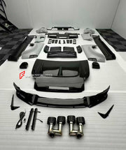 DRY CARBON WIDE BODY KIT for LAND ROVER DEFENDER L663 90 2020+

Set includes:

Front Lip
Front Bumper Trims
Front Grille
Hood / Bonnet
Side Mirrors Covers
Front Fenders
Roof Led Bar
Side Skirts
Rear Fenders
Rear Trunk Cover
Rear Bumper
Rear Diffuser
Exhaust Tips

Material: Dry Carbon

Note: Professional installation is required.