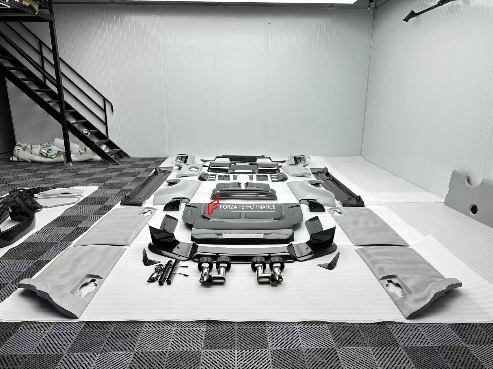 DRY CARBON WIDE BODY KIT for LAND ROVER DEFENDER L663 90 2020+

Set includes:

Front Lip
Front Bumper Trims
Front Grille
Hood Bonnet
Side Mirrors Covers
Front Fenders
Roof Led Bar
Side Skirts
Rear Fenders
Rear Trunk Cover
Rear Bumper
Rear Diffuser
Exhaust Tips

Material: Dry Carbon

Note: Professional installation is required.