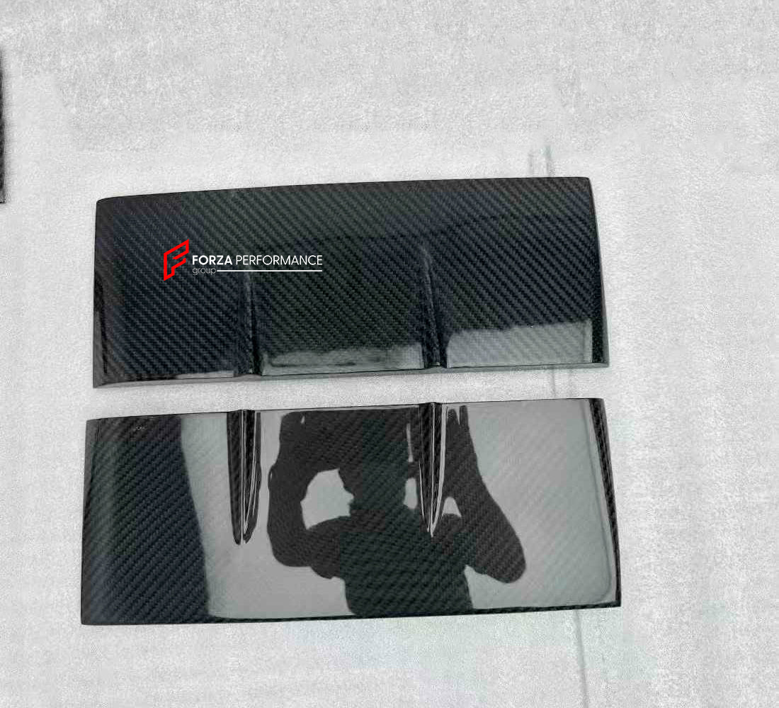 DRY CARBON WIDE BODY KIT for LAND ROVER DEFENDER L663 90 2020+

Set includes:

Front Lip
Front Bumper Trims
Front Grille
Hood Bonnet
Side Mirrors Covers
Front Fenders
Roof Led Bar
Side Skirts
Rear Fenders
Rear Trunk Cover
Rear Bumper
Rear Diffuser
Exhaust Tips

Material: Dry Carbon

Note: Professional installation is required.