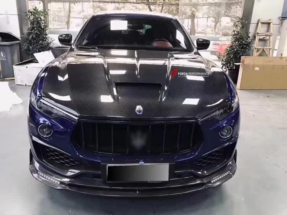 BODY KIT for Maserati LEVANTE M161 2016 - 2020
Set includes:

Front Vented Hood
Front Lip
Front Splitter
Front Mask Cover 8 pcs
Front Bar Cover
Front Fender Door Strip
Rear Diffuser With SS Exhaust Blinds
Roof Spoiler Extension
Rear Deck Lid Spoiler
Rear Bar Cover
Wide Body Fender Flare
Side Skirt
Material: Dry Carbon

NOTE: Professional installation is required. May require to change or modify wheel liners and bottom engine protection