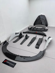 DRY CARBON BODY KIT for MCLAREN 750S 2023+ Forza Performance Style Custom Fit Design RYFT Style
Set includes:

Front Lip
Front Fenders
Side Skirts
Hood Bonnet
Rear Diffuser
Rear Spoiler
Material: Dry Carbon

NOTE: Professional installation is required.