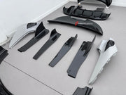 DRY CARBON BODY KIT for MCLAREN 750S 2023+ Forza Performance Style Custom Fit Design RYFT Style
Set includes:

Front Lip
Front Fenders
Side Skirts
Hood Bonnet
Rear Diffuser
Rear Spoiler
Material: Dry Carbon

NOTE: Professional installation is required.