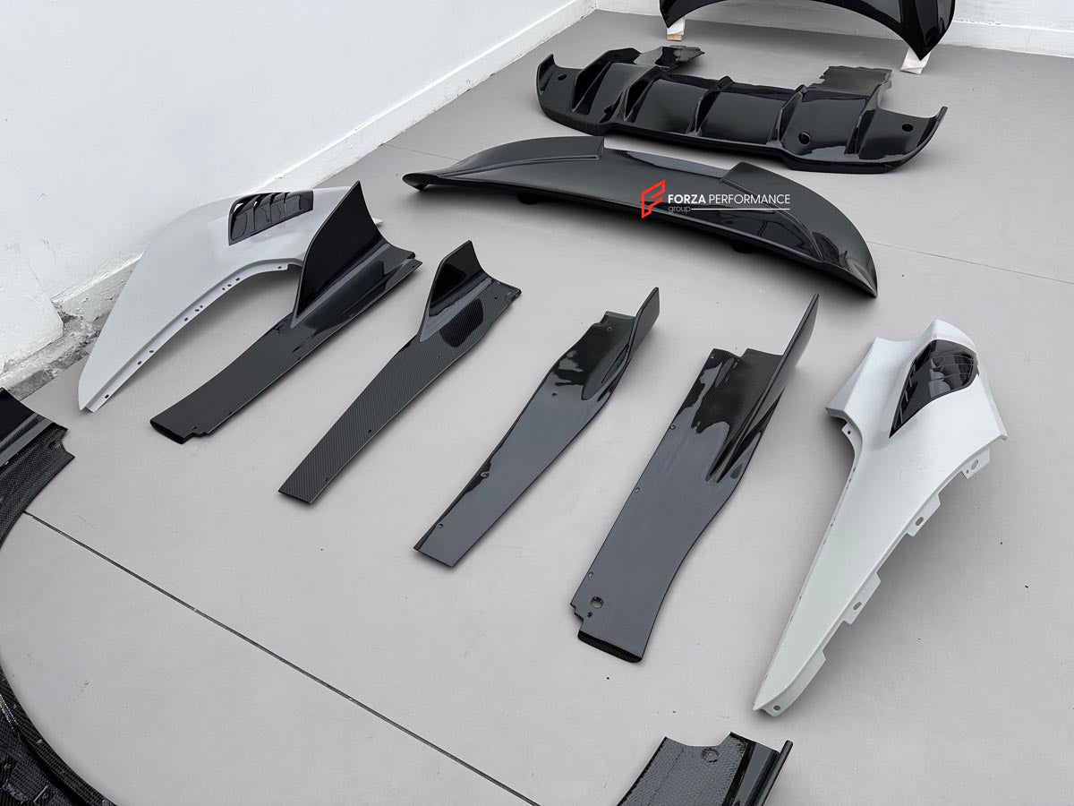 DRY CARBON BODY KIT for MCLAREN 750S 2023+ Forza Performance Style Custom Fit Design RYFT Style
Set includes:

Front Lip
Front Fenders
Side Skirts
Hood Bonnet
Rear Diffuser
Rear Spoiler
Material: Dry Carbon

NOTE: Professional installation is required.