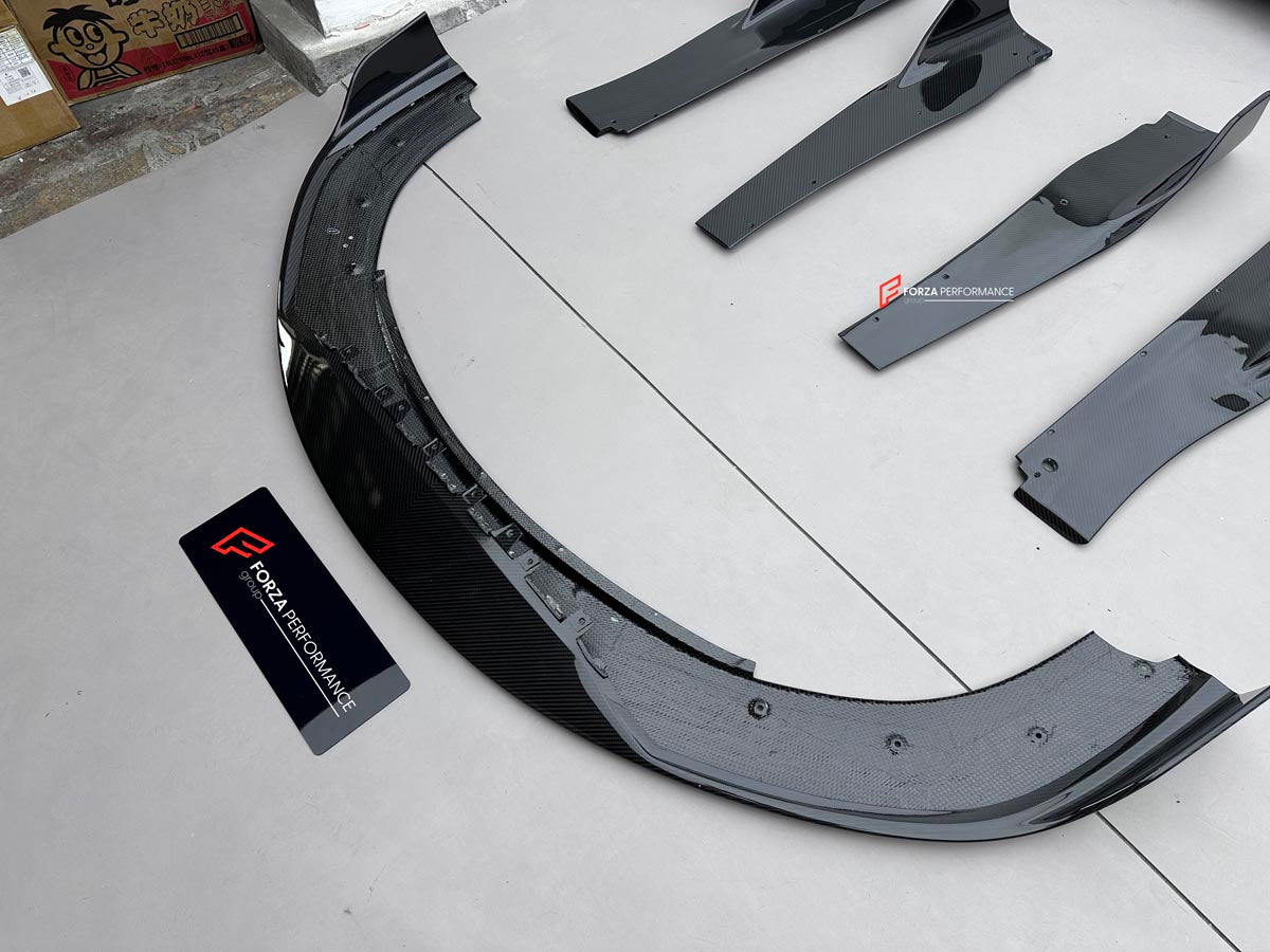 DRY CARBON BODY KIT for MCLAREN 750S 2023+ Forza Performance Style Custom Fit Design RYFT Style
Set includes:

Front Lip
Front Fenders
Side Skirts
Hood Bonnet
Rear Diffuser
Rear Spoiler
Material: Dry Carbon

NOTE: Professional installation is required.