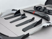 DRY CARBON BODY KIT for MCLAREN 750S 2023+ Forza Performance Style Custom Fit Design RYFT Style
Set includes:

Front Lip
Front Fenders
Side Skirts
Hood Bonnet
Rear Diffuser
Rear Spoiler
Material: Dry Carbon

NOTE: Professional installation is required.