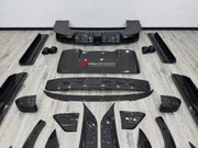 DRY CARBON WIDE BODY KIT for ZEEKR 9X 2025+ FORZA PERFORMANCE custom fit Mansory Style

Set includes:
Front Lip
Front Bumper Assembly
Front Grille
Hood Bonnet
Fender Flares
Side Mirror Covers
Side Skirts
Roof Spoiler
Rear Spoiler Wing
Rear Window Air Vent Trims
Rear Diffuser
Exhaust Tips

Material: Dry Carbon

NOTE: Professional installation is required.