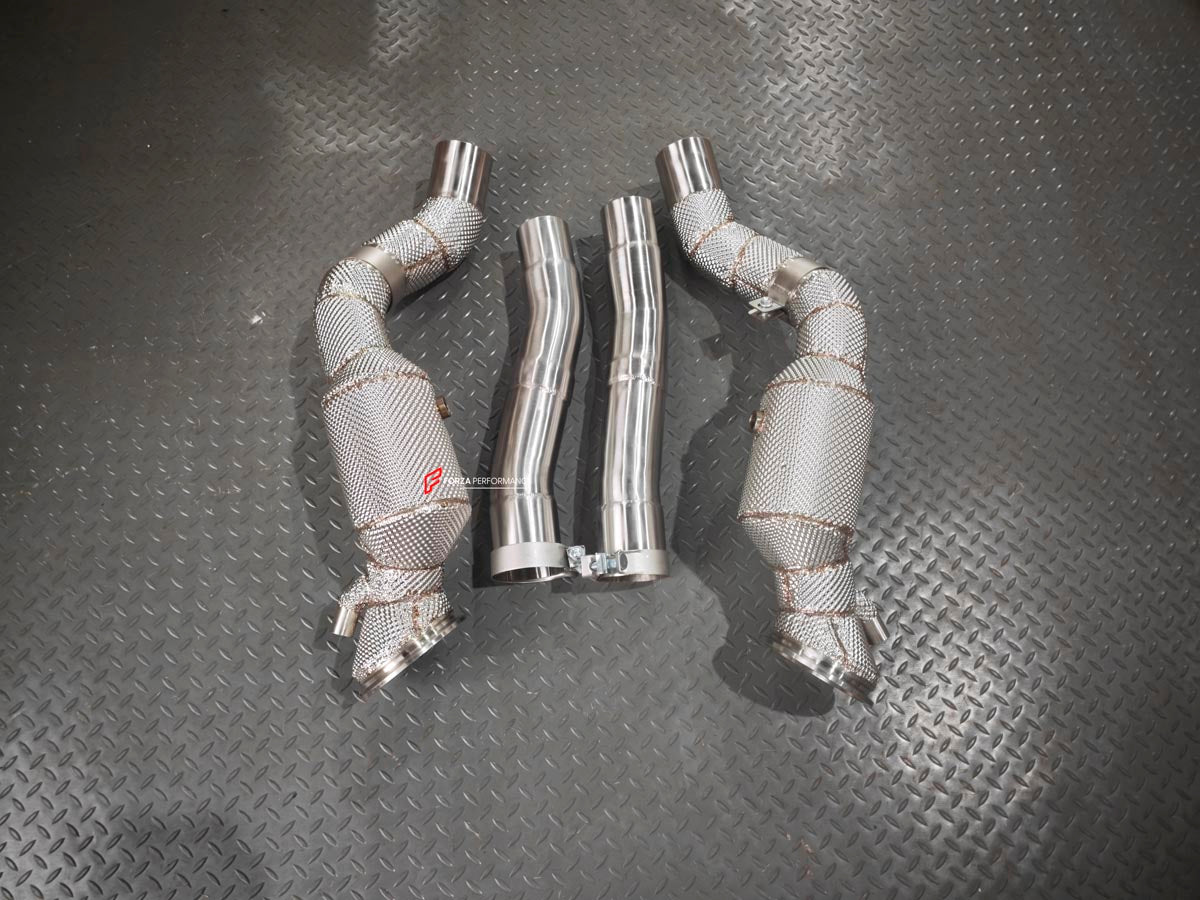 EXHAUST 200 CELL DOWNPIPE for FERRARI 12 CILINDRI V12 6.5 2024+ FORZA PERFORMANCE Custom Fit

Set includes:

200 Cell Sport Catalytic Downpipes
Connecting Pipes
Material: Stainless Steel (Can be made of Titanium)

Production time: 10–15 days
