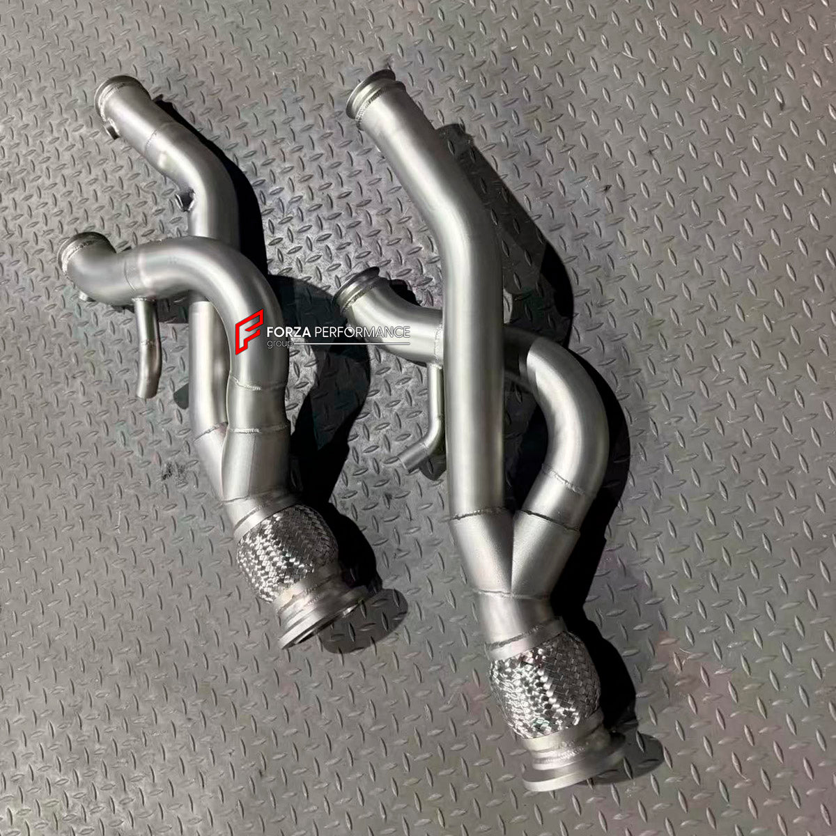 EXHAUST DOWNPIPE for LAMBORGHINI REVUELTO 2023+

Set includes:

Downpipe
Material: Stainless Steel 

NOTE: Professional installation is required.